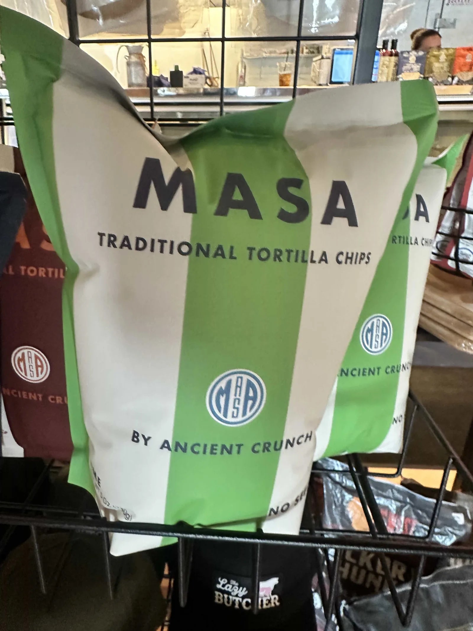 Bags of Masa traditional tortilla chips on the market shelf