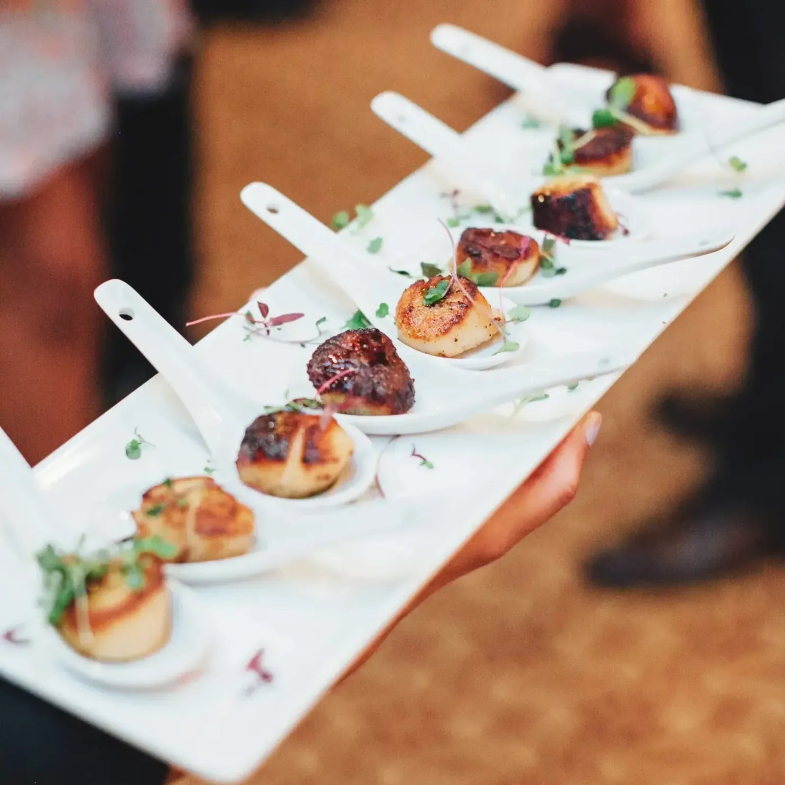 BBQ sliders set out for a wedding reception